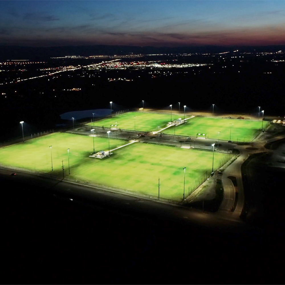 sports field at night with lights on